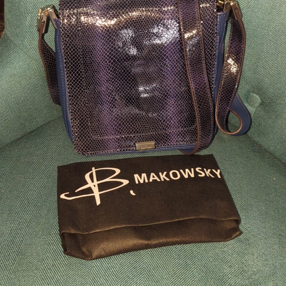 B. Makowsky Blue leather crossbody with a Dusty